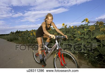 Stock Photograph -  people sport fahrrad outdoor verkehr aktiv. Fotosearch