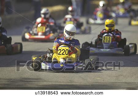 Stock Image -  people sport gokart no model release activity. Fotosearch
