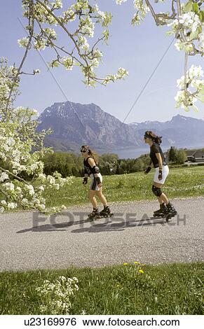 Stock Photograph -  people sport inline skating activity aktiv im. Fotosearch