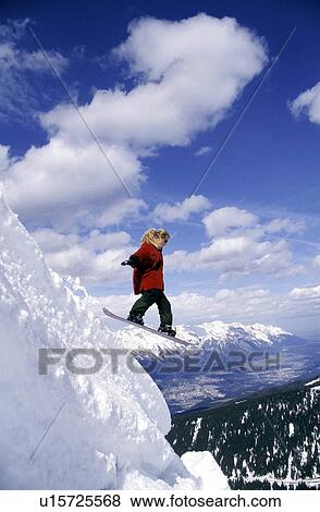 Stock Photo -  people sport snowboard outdoor action activity. Fotosearch