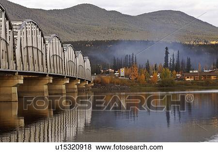 Stock Photo -  teslin lake bridge alaska highway trees. Fotosearch