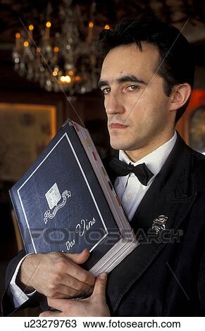 Stock Image -  waiter paris restaurant la tour dargent france. Fotosearch