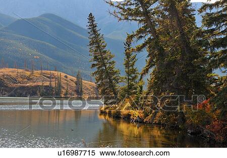 Stock Photography -  water backlit autumn landscape image taken lake. Fotosearch
