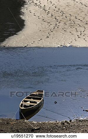 Stock Image -  water boat shore medicine lake in jasper park. Fotosearch