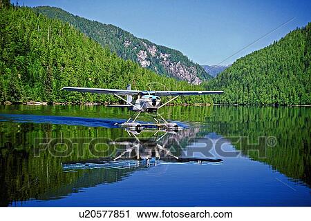 water float plane landing calm lake coast canada View Large Photo Image Stock Image - water float plane landing calm lake coast canada. Fotosearch
