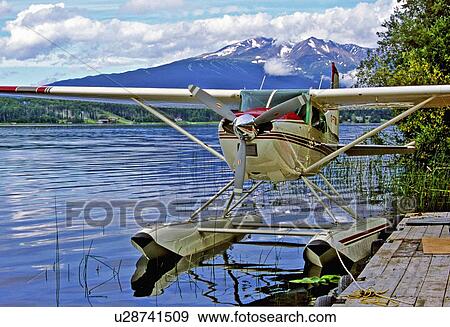 water float plane tied lake dock smithers canada View Large Photo Image Stock Photo - water float plane tied lake dock smithers canada. Fotosearch