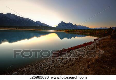 water maligne lake mountains plants autumn pine View Large Photo Image Stock Image - water maligne lake mountains plants autumn pine. Fotosearch
