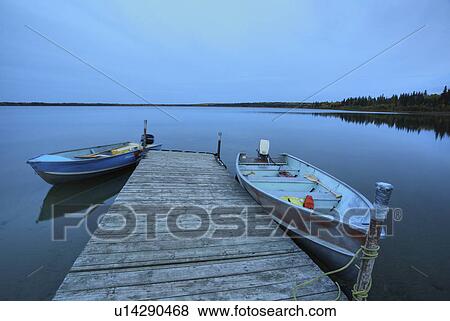 water motorboats dock mustus lake in meadow park View Large Photo Image Stock Photo - water motorboats dock mustus lake in meadow park. Fotosearch