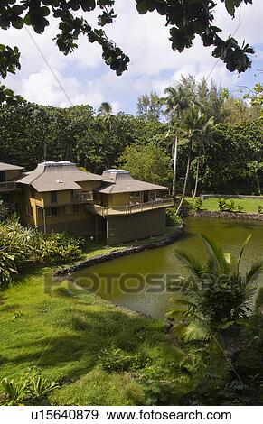 Stock Photo -  water relaxing hana hale inn bungalows in remote. Fotosearch