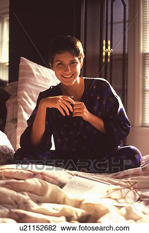 woman coffee person home relaxing in bed cup tea View Large Photo Image Stock Image - woman coffee person home relaxing in bed cup tea. Fotosearch