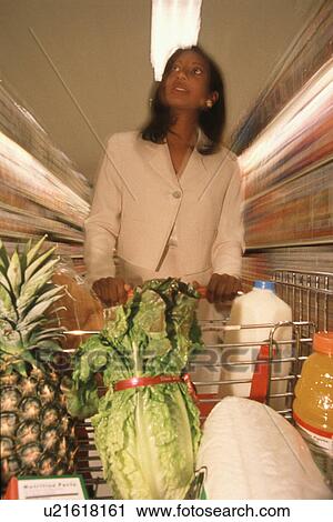woman food shopping person in store 30-35 years View Large Photo Image Stock Image - woman food shopping person in store 30-35 years. Fotosearch
