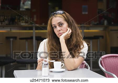 Stock Image -  woman madchen im young coffeeshop model released. Fotosearch