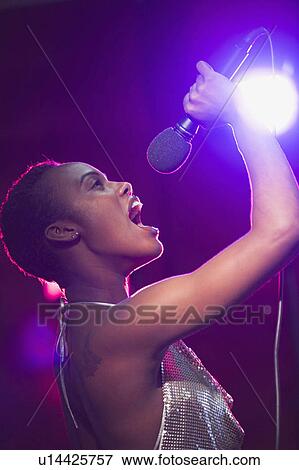 woman music people person singer 20-25 years 20s View Large Photo Image Stock Photo - woman music people person singer 20-25 years 20s. Fotosearch