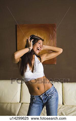 woman music young listening obn head phones 20-25 View Large Photo Image Stock Photography - woman music young listening obn head phones 20-25. Fotosearch