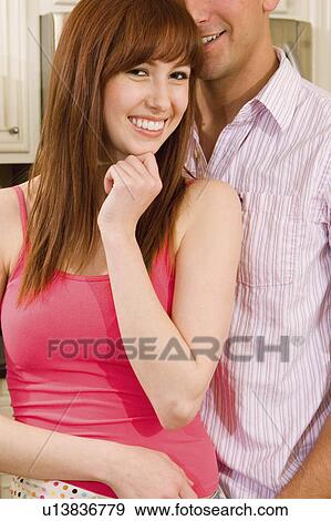 woman people couple man standing together in 20s View Large Photo Image Stock Photo -  woman people couple man standing together in 20s. Fotosearch
