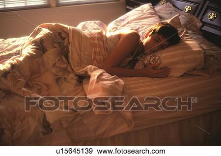 woman person sleeping sunny morning 20-25 years View Large Photo Image Stock Photo - woman person sleeping sunny morning 20-25 years. Fotosearch