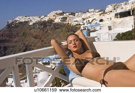 woman young attractive aged 20s porch white fira View Large Photo Image Stock Photo - woman young attractive aged 20s porch white fira. Fotosearch
