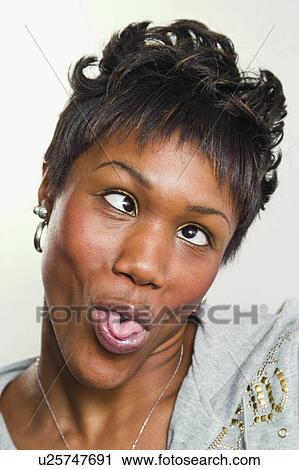 Stock Image -  woman young black posing model released 20-25, 20s. Fotosearch