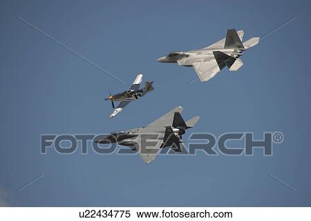 airshow showing p51 mustang f22 raptor f15e View Large Photo Image Stock Photography - airshow showing p51 mustang f22 raptor f15e. Fotosearch