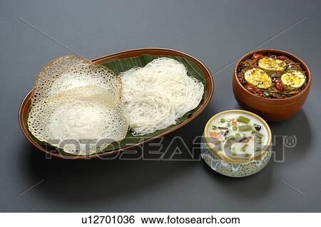Stock Photograph -  appam egg curry vegetable stew dishes foods. Fotosearch