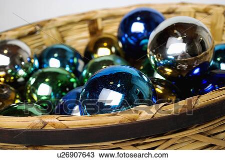 art closeup marble balls in wicker basket craft View Large Photo Image Stock Image - art closeup marble balls in wicker basket craft. Fotosearch