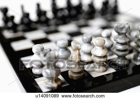 Stock Photo -  art closeup mexican onyx chess set craft board. Fotosearch