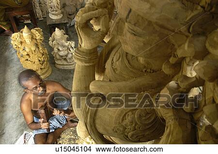 Picture -  art wood carving sculptors sculpture carvings. Fotosearch