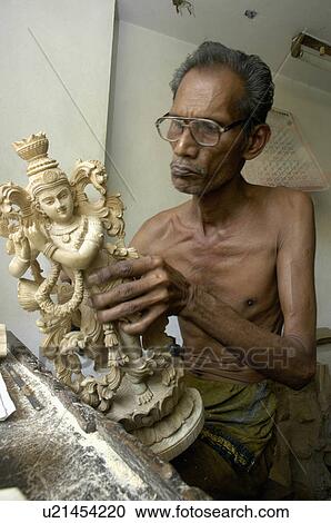 art wood carving sculptors sculpture carvings View Large Photo Image Stock Image - art wood carving sculptors sculpture carvings. Fotosearch