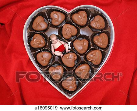 Stock Photo -  baby food heart child person chocolate in box 01. Fotosearch