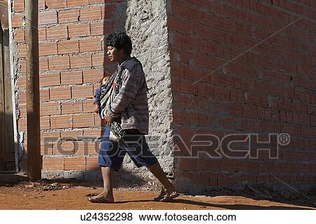 Stock Photo -  baby man brazil aldeia tekoa pyau guarani mbya . Fotosearch