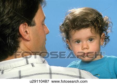 Stock Photo -  background baby people child face father son 01. Fotosearch