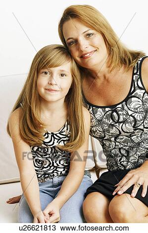 Stock Image -  background family girl child portrait smiling 8-9. Fotosearch