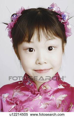 Stock Photography - background girl child portrait in clothing 6-7 years. Fotosearch