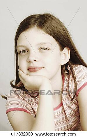 Stock Image -  background hand girl child portrait chin 10-11. Fotosearch