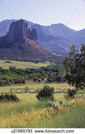 Stock Image -  background needle rock volcanic plug or lava. Fotosearch