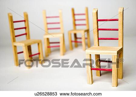 Stock Image -  background people art closeup wooden chairs. Fotosearch