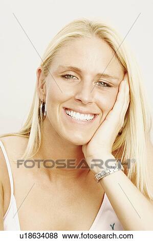 Stock Photo -  background woman portrait young smiling 20-24. Fotosearch
