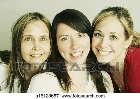 Stock Photo -  background woman women portrait two young mid adults. Fotosearch