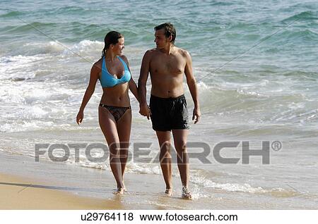beach couple tourists in kovalam trivandrum pair View Large Photo Image Stock Photo - beach couple tourists in kovalam trivandrum pair. Fotosearch