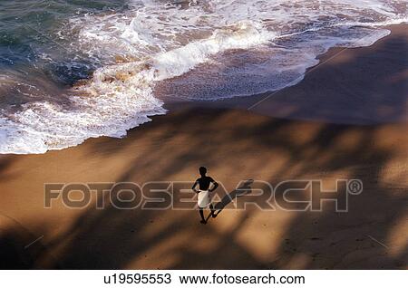 Stock Image -  beach man nature local waiting in pulingudi dist. Fotosearch