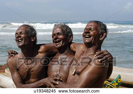 Stock Photography -  beach old wise fishermen having good time kerala. Fotosearch