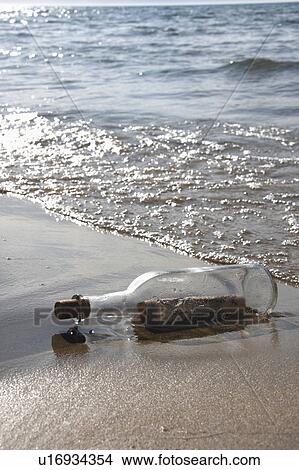 beach water message in bottle theme portrait View Large Photo Image Picture - beach water message in bottle theme portrait. Fotosearch