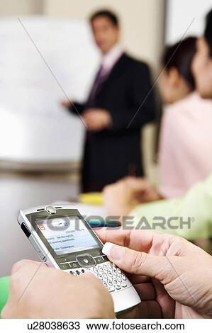 business closeup persons hands holding palmtop View Large Photo Image Stock Image - business closeup persons hands holding palmtop. Fotosearch