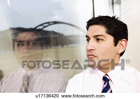 Stock Image -  business closeup thinking looking away 30-34 hair. Fotosearch