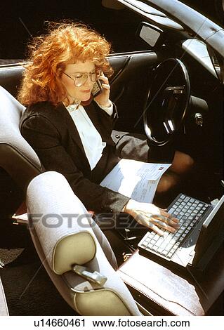 business computer car laptop attractive young View Large Photo Image Stock Image - business computer car laptop attractive young . Fotosearch