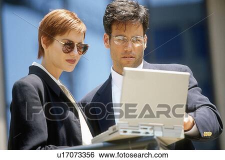 Stock Photograph -  business computer people use wireless device 2. Fotosearch