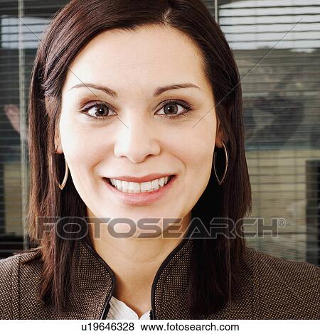 Stock Photo -  business face portrait smiling 30-34 years brown. Fotosearch