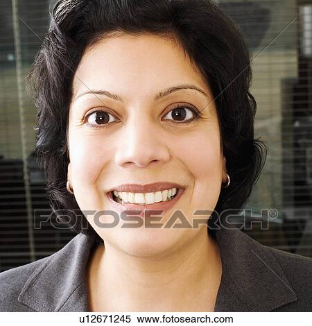 Stock Photography -  business face portrait smiling 30-34 years black. Fotosearch