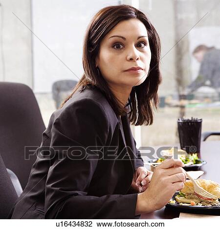 Stock Image -  business food office portrait eating 30-34. Fotosearch