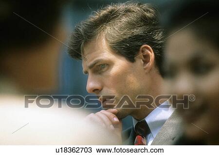 Stock Image -  business office man person face in deep thought. Fotosearch